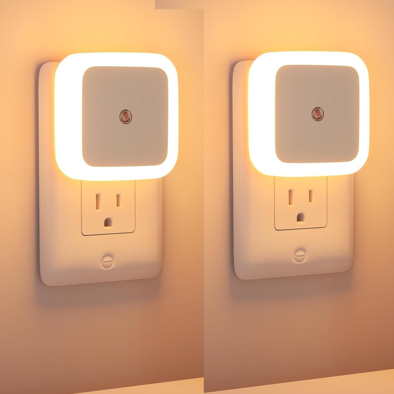 Soft glowing LED night light plugged into wall outlet with warm ambient lighting