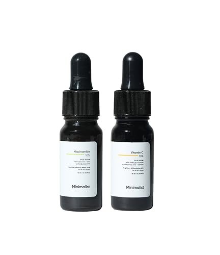 Minimalist Niacinamide serum and Vitamin C serum bottles for acne marks and skin brightening